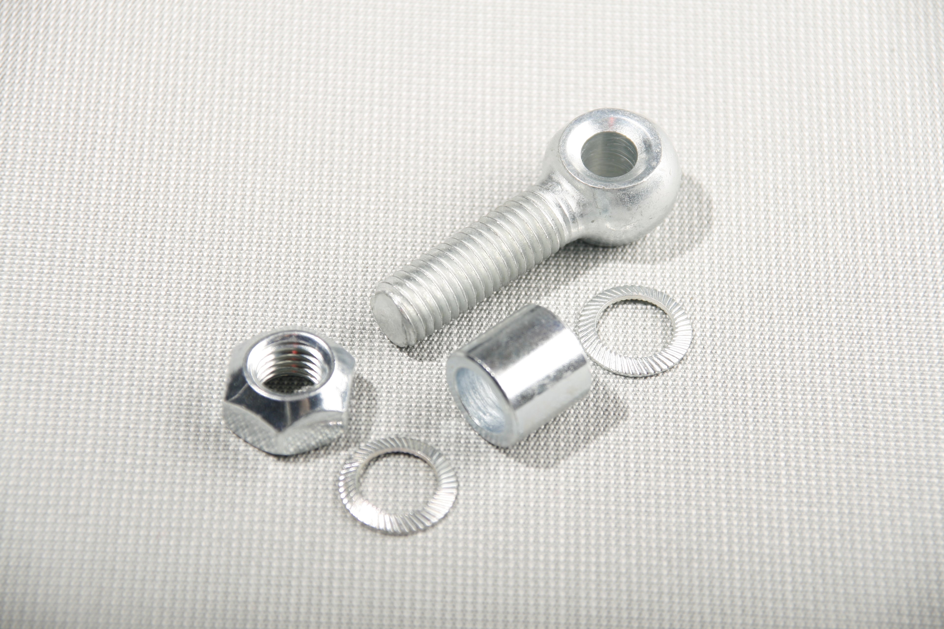Eye bolt M10 x 40 mm, Hex nut, self-locking M10, Spacer for eye bolt, Lock washer S.