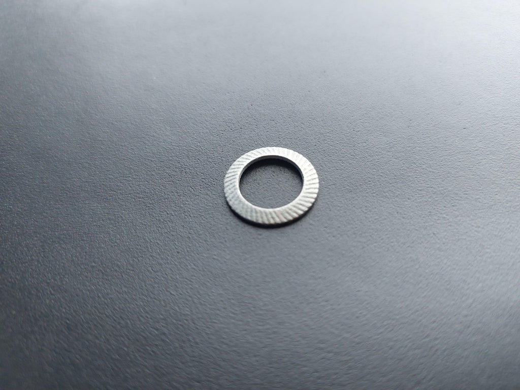 Lock washer, galvanised, outer ø 16 mm, inner ø 10.5 mm.