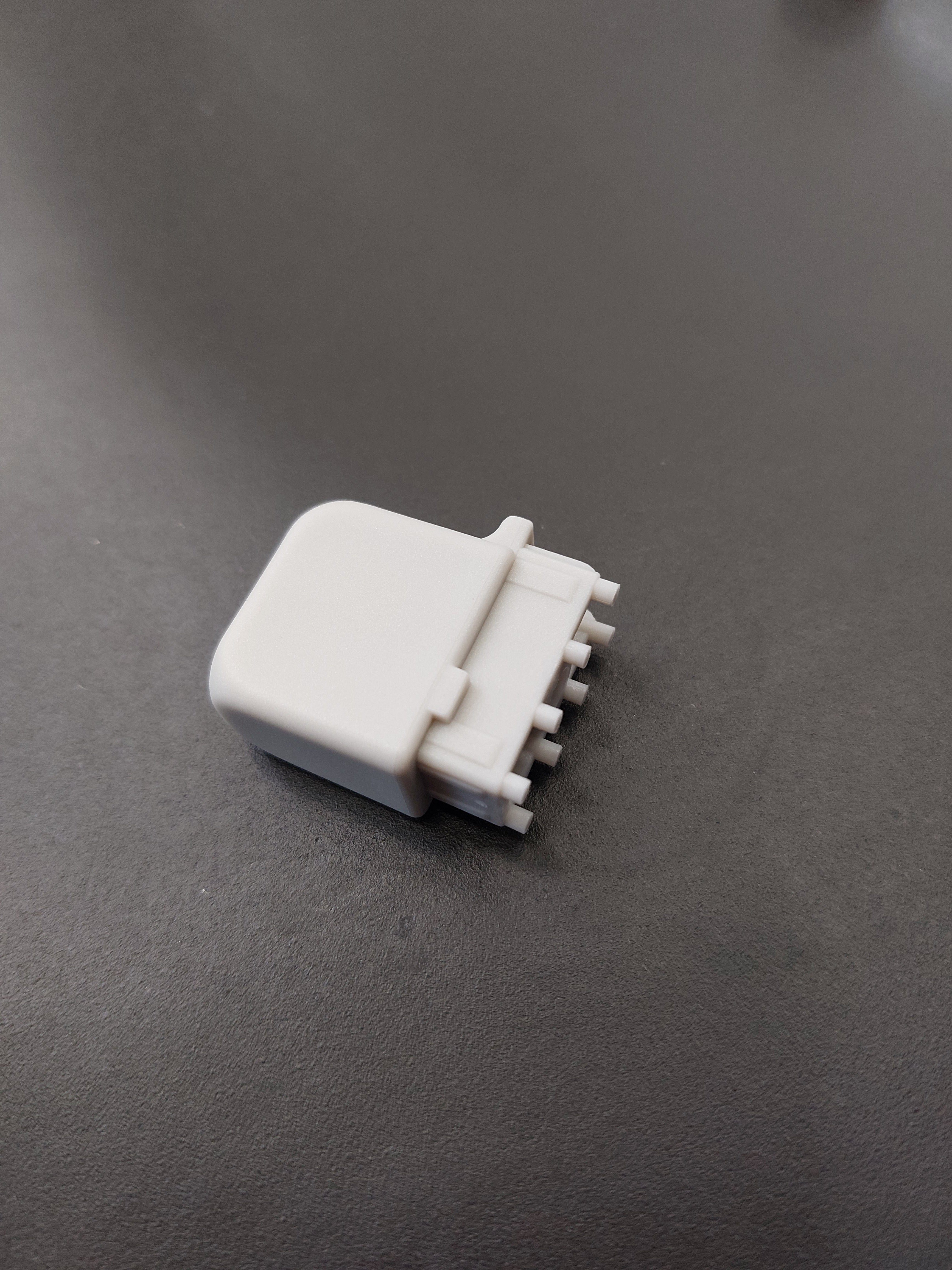 End cap, on telescopic shaft for end of spoke, long version, fixation with screw, (since 2018), glass fibre reinvorced plastic, grey, for frame in RAL 9006, 30 x 15 mm, length 32 mm, for SCHATTELLO.