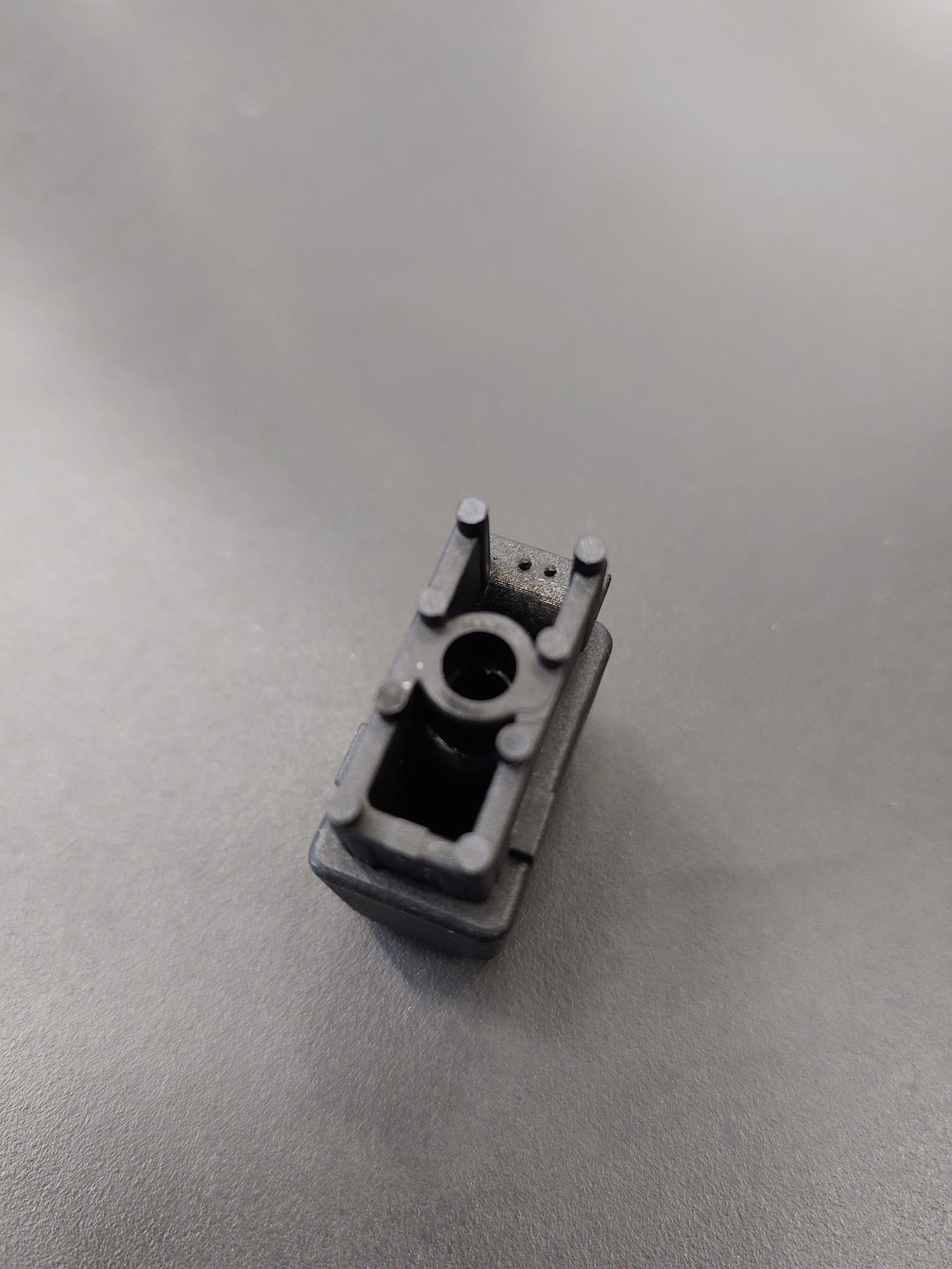 End cap on telescopic shaft for end of spoke, long version, fixation with screw, (since 2017 / 2018) plastic in black, 40 x 20 mm, length 39 mm, for ALBATROS.