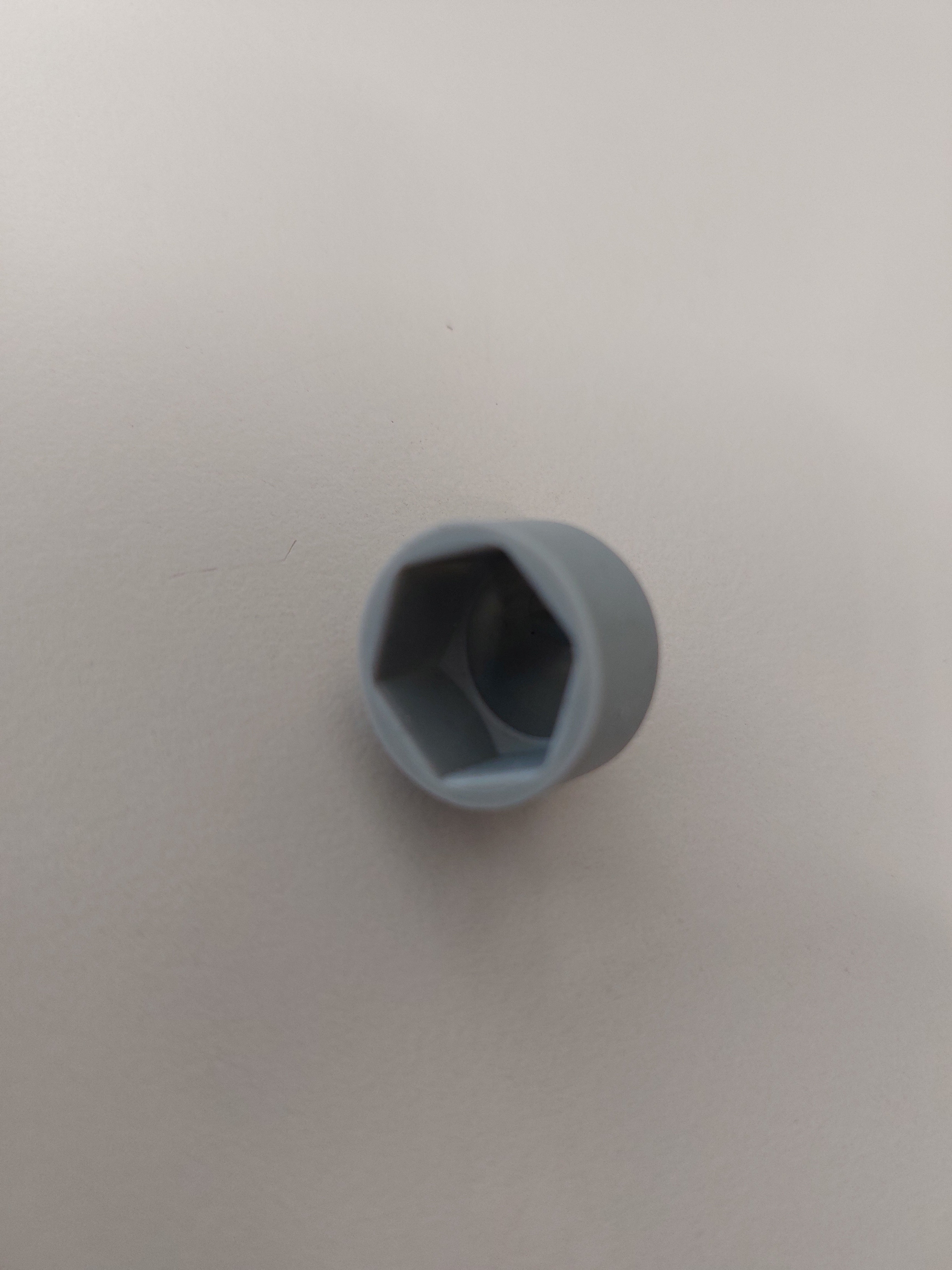 Cover cap for M10 hex nut, thick-walled version, for frame in RAL 9006, (since approx. 2013), plastic grey, outer ø 23 mm, length 18 mm.